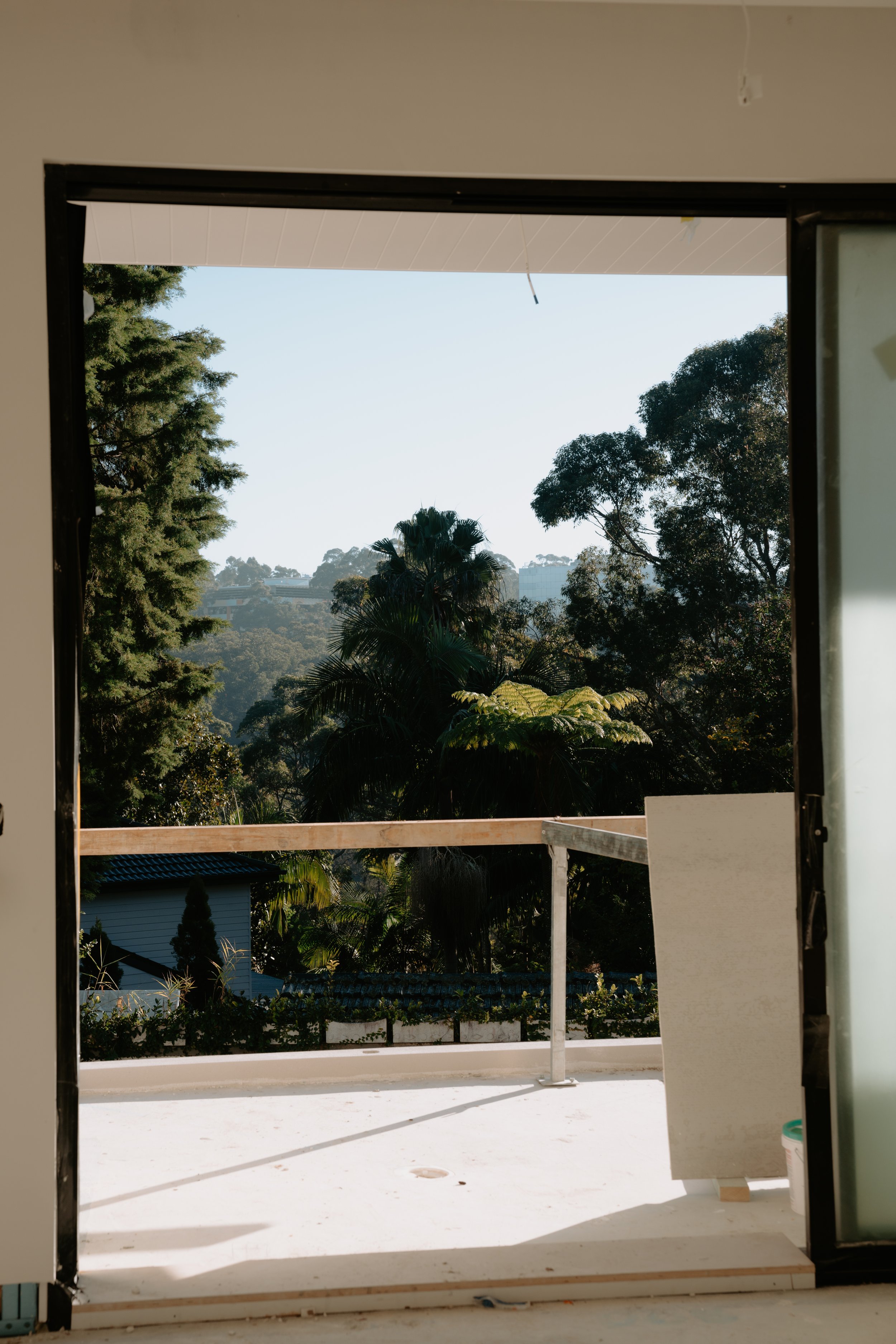 window overlooking forest greenery of Sydney home