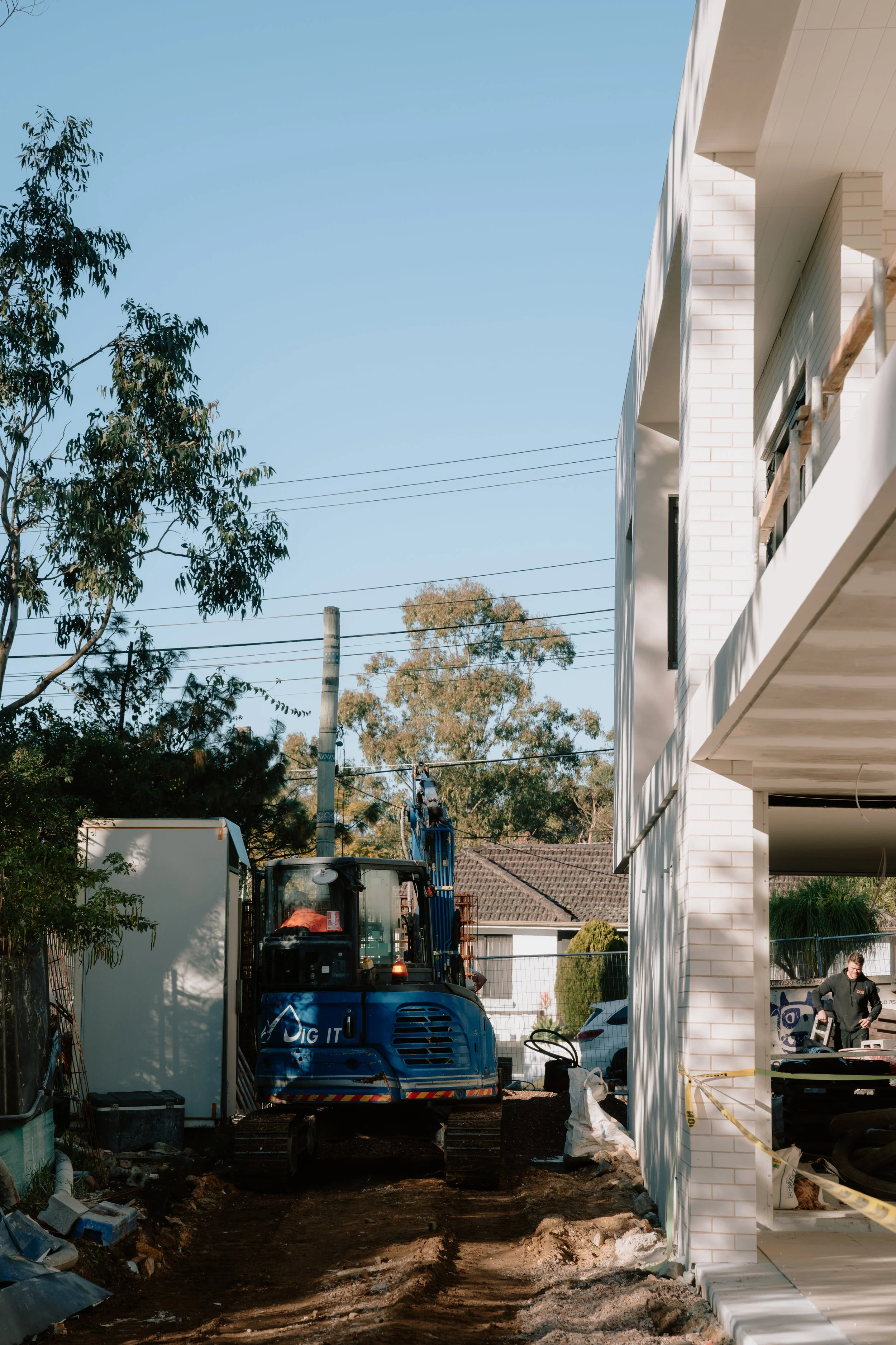Excavator on job-site for a custom home in Sydney