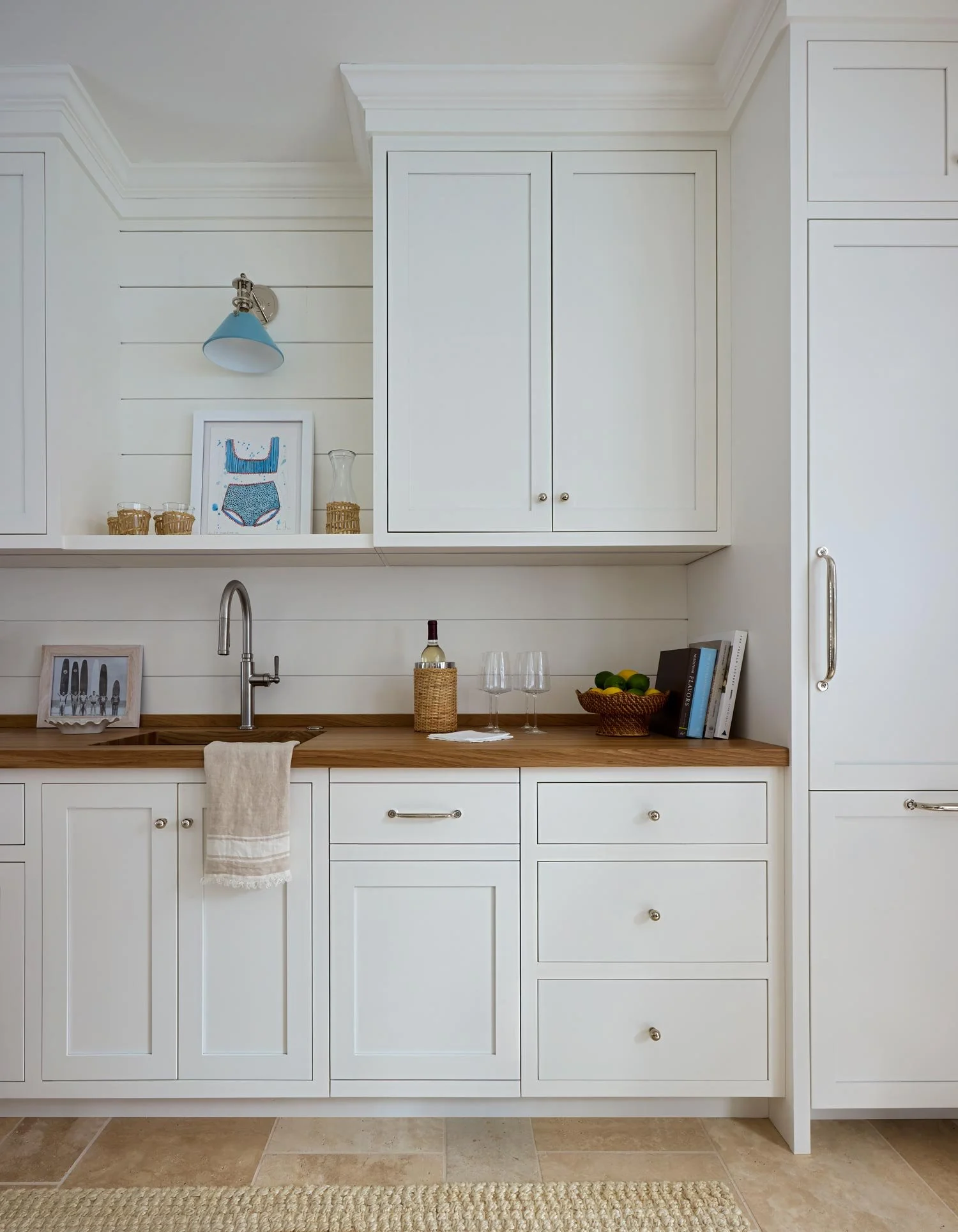 Elizabeth Hartz interior designer Virginia Beach guest suite kitchen with white cabinetry, wood countertops, integrated sink, and coastal styling with clean, relaxed detailing