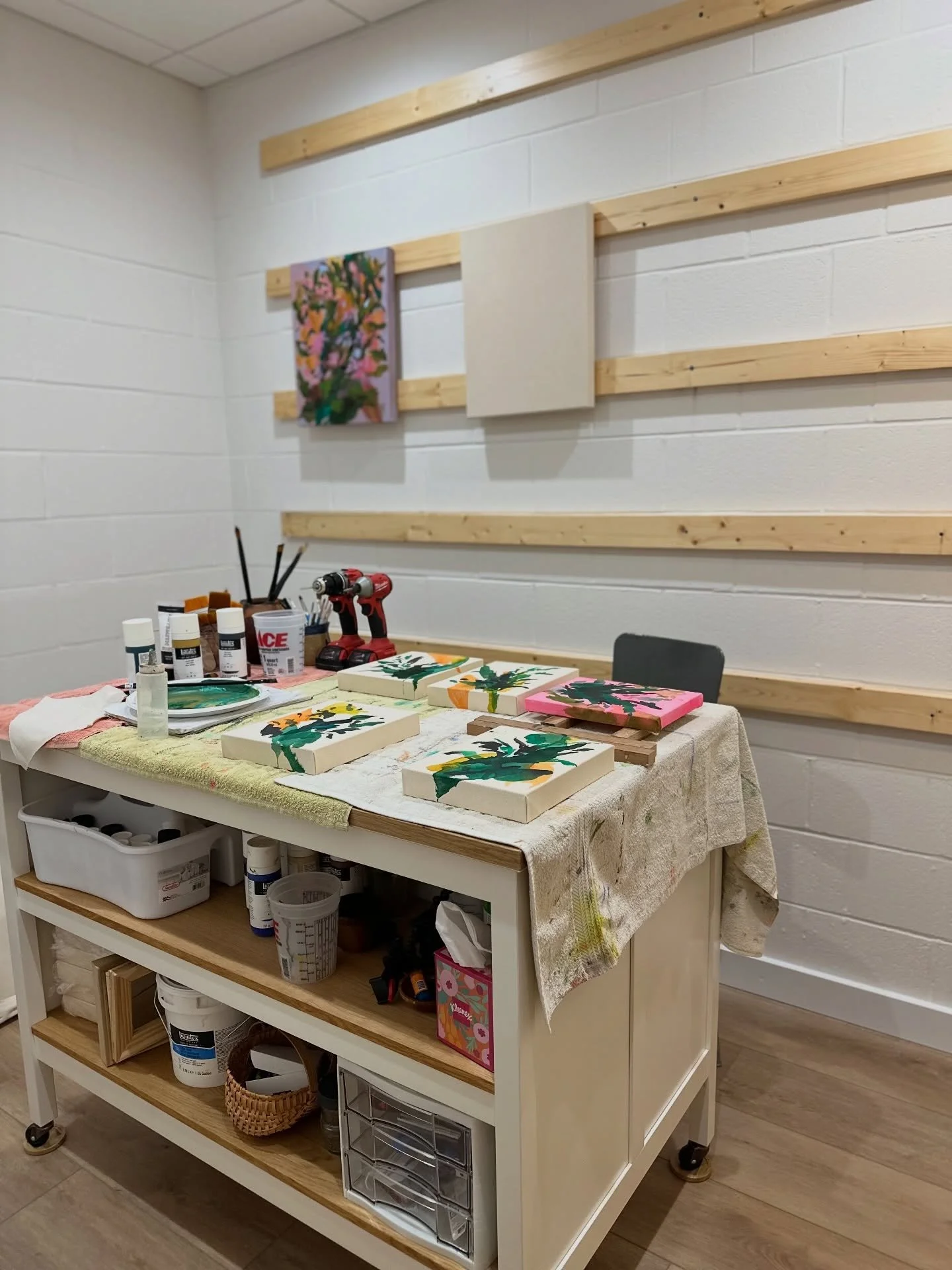 Husband worked so hard over the past few months making me an art studio. He installed the ceiling and flooring and ran electric and HVAC venting and even put in wood panels that I can easily drill into to rearrange canvases on. And you know that cent