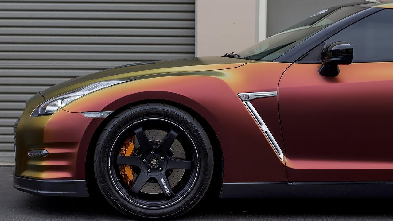 Front side of a sports car with Avery Dennison Rising Sun Colour vinyl wrap.