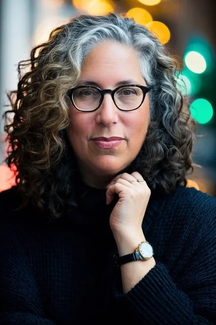 Headshot of Mara Isaacs