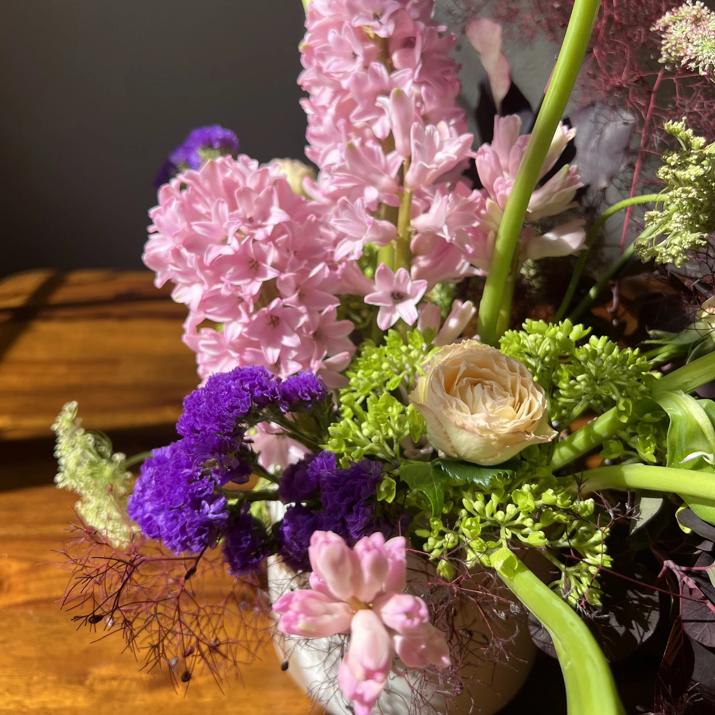 Close-up of a whimsical floral arrangement for Mother’s Day