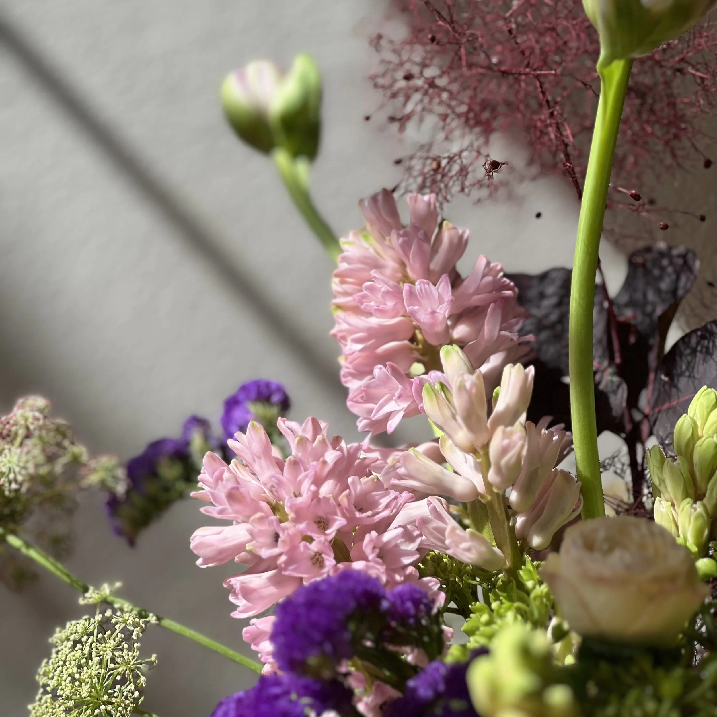 Close-up of a whimsical floral arrangement for Mother’s Day