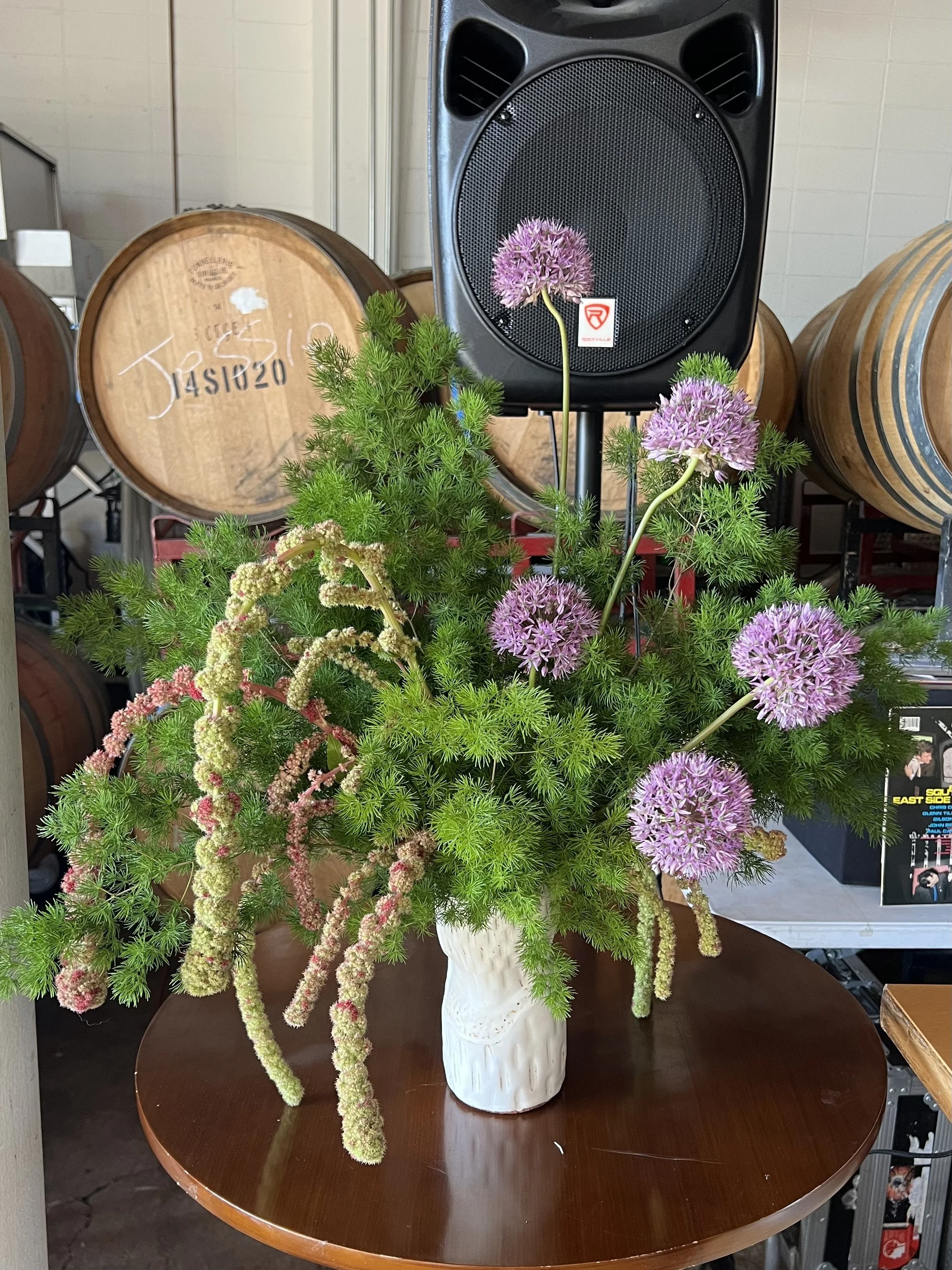 Playful floral arrangement for a winery by Wilder Bloom.