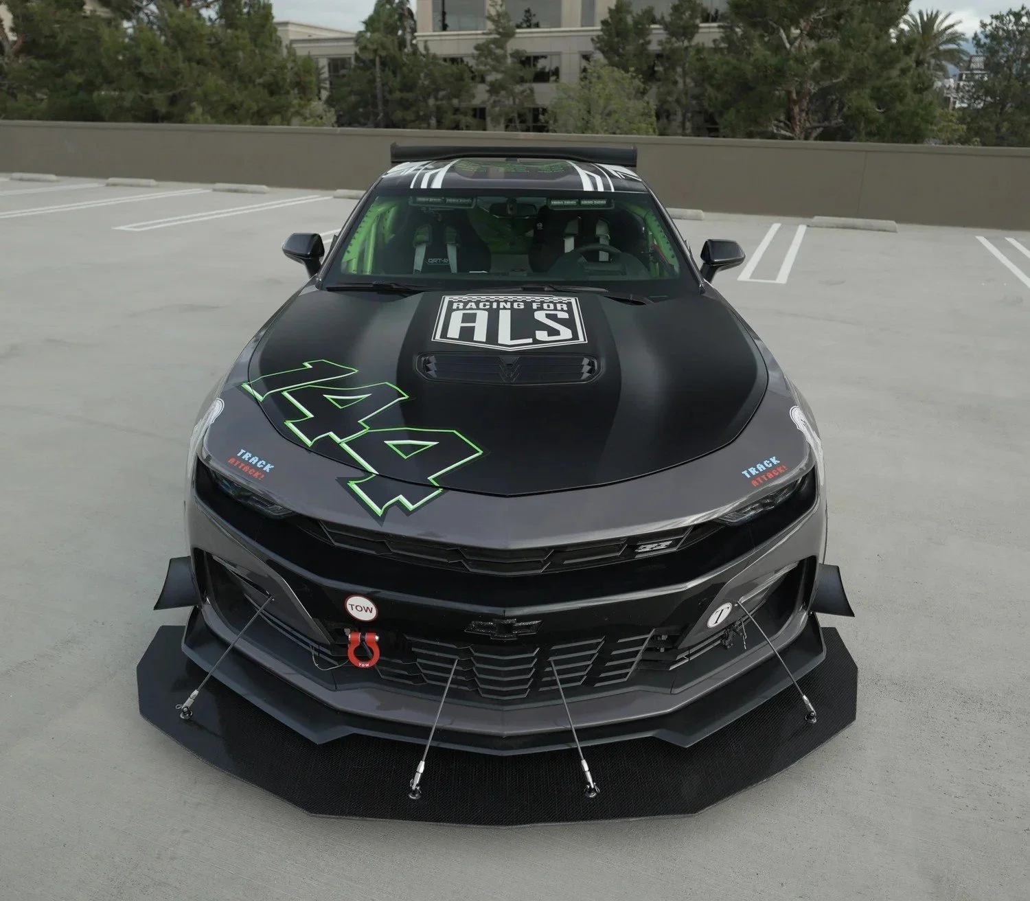 Custom carbon fiber front splitter on a Camaro