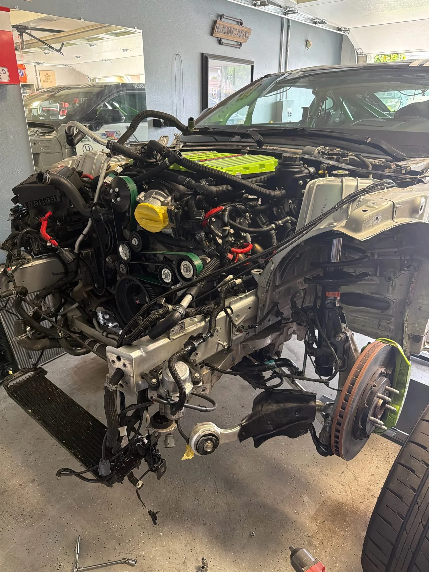 Wilder Racing #144 Camaro engine bay during a build in the home garage