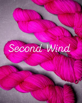 Hand dyed pink yarn from Megs & Co. Yarn - The Pink matches the brand colors of Lauren Wilson's ILCA 6 Olympic Sailing Campaign - Megs & Co. is a sponsor of Second Wind Racing - Click here to purchase the yarn