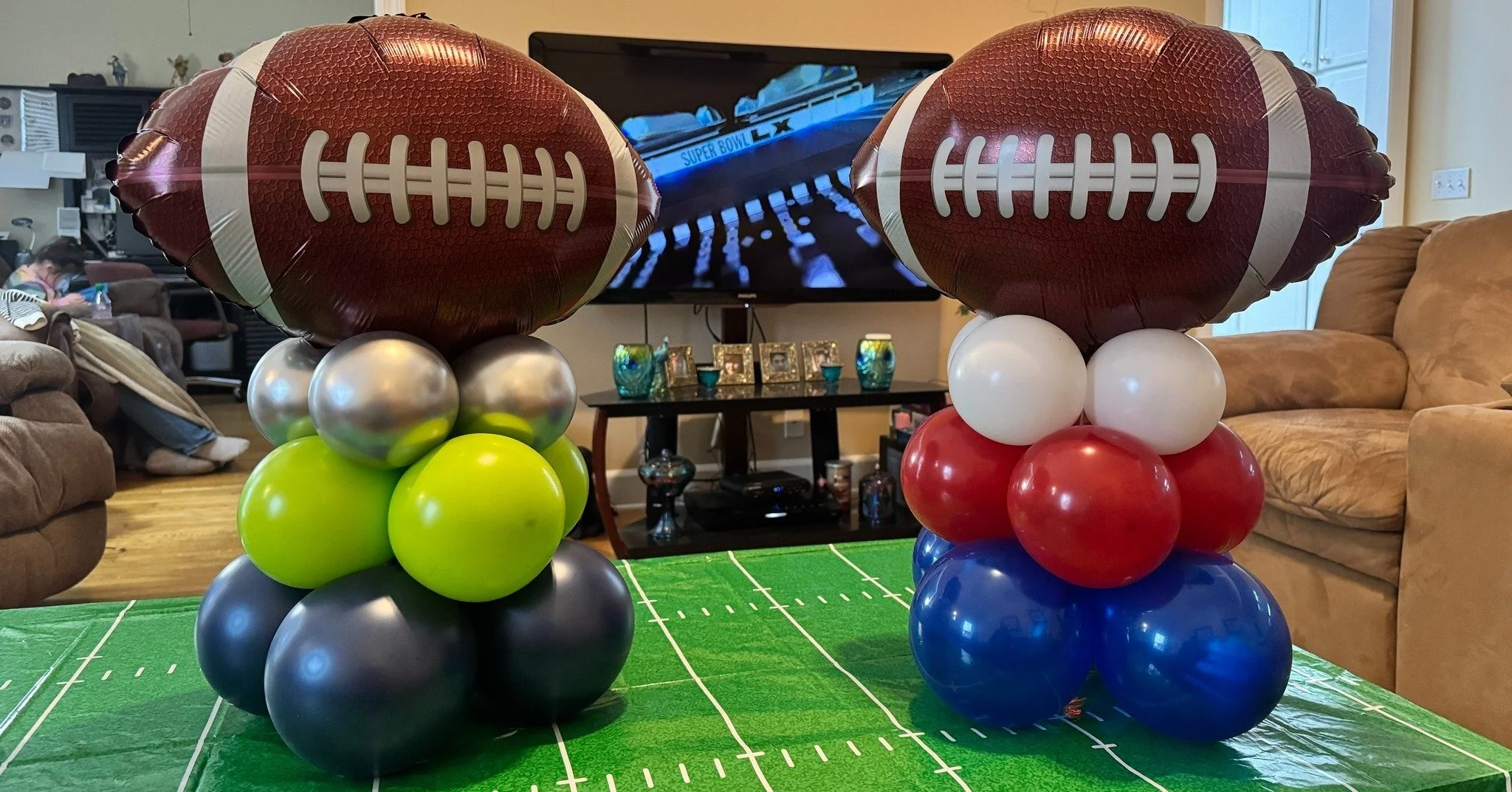 Which balloon centerpiece will win? 🏈
First Pic is unaltered. Next ones use AI created backgrounds without changing the look or colors of the balloons. Who knew how good my balloons would look in Levi's Stadium!
-Seattle Seahawks: Decomex Midnight B