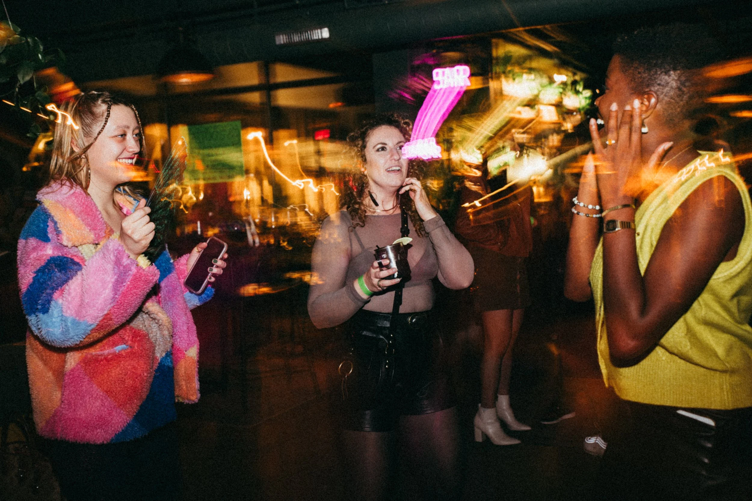 people talking in an night cub.jpg