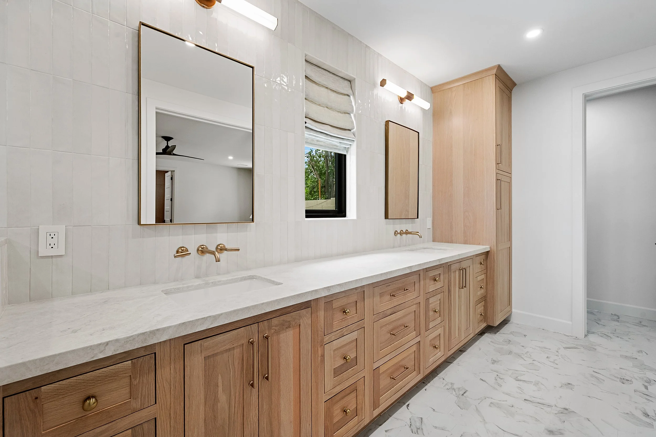 Custom inset white oak cabinetry by Shiloh Cabinetry, available through Cactus Millwork Company in Phoenix, AZ. Beautifully crafted for a timeless, furniture-style look with clean lines and refined detailing.