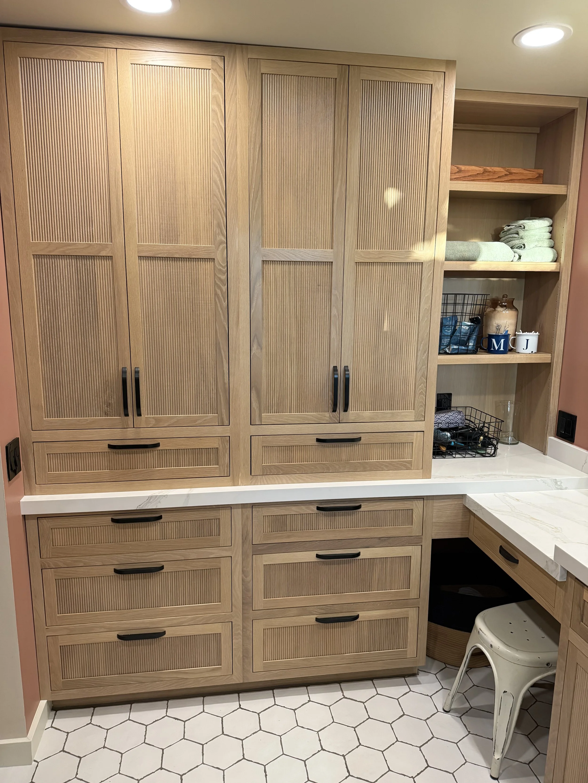 White oak, reeded inset custom cabinetry from Shiloh Cabinets