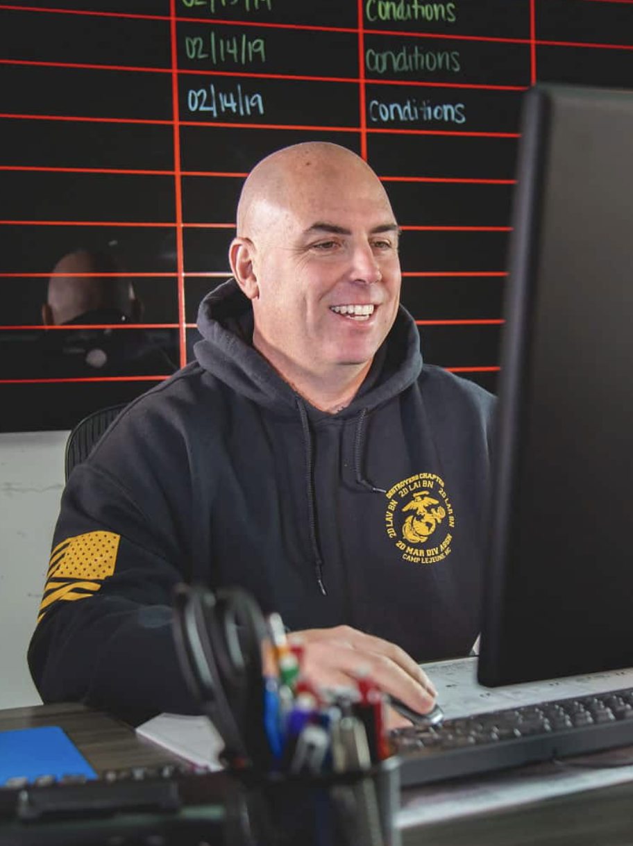 Firehouse Mortgage loan specialist assisting clients with mortgage applications and loan options in Texas.