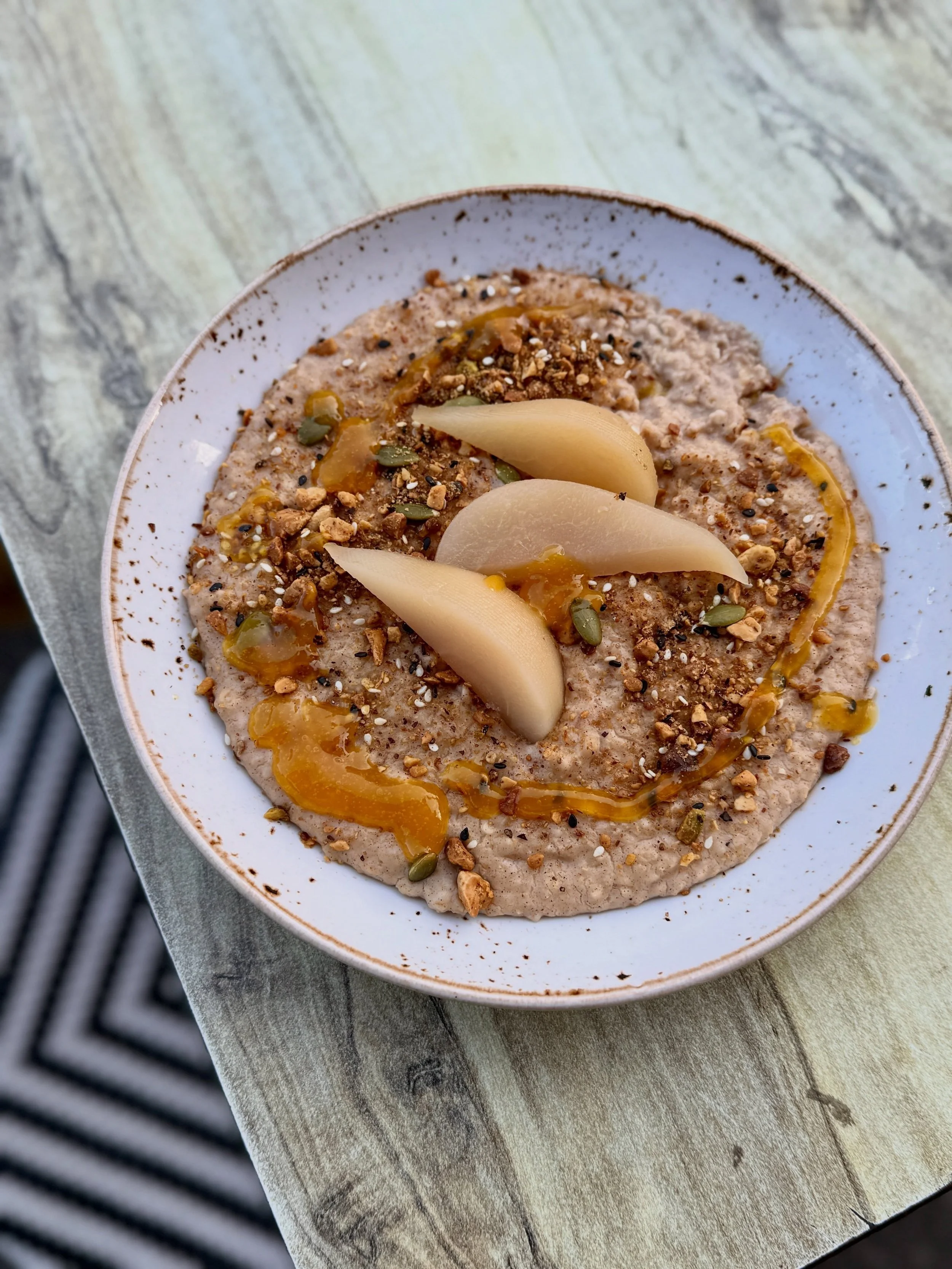 These cooler mornings call for something warm and nourishing, like our Autumn Porridge.

It&rsquo;s packed with seasonal flavours and topped with poached pear, making it the perfect way to ease into your day.

Order your favourite tea or coffee, get 