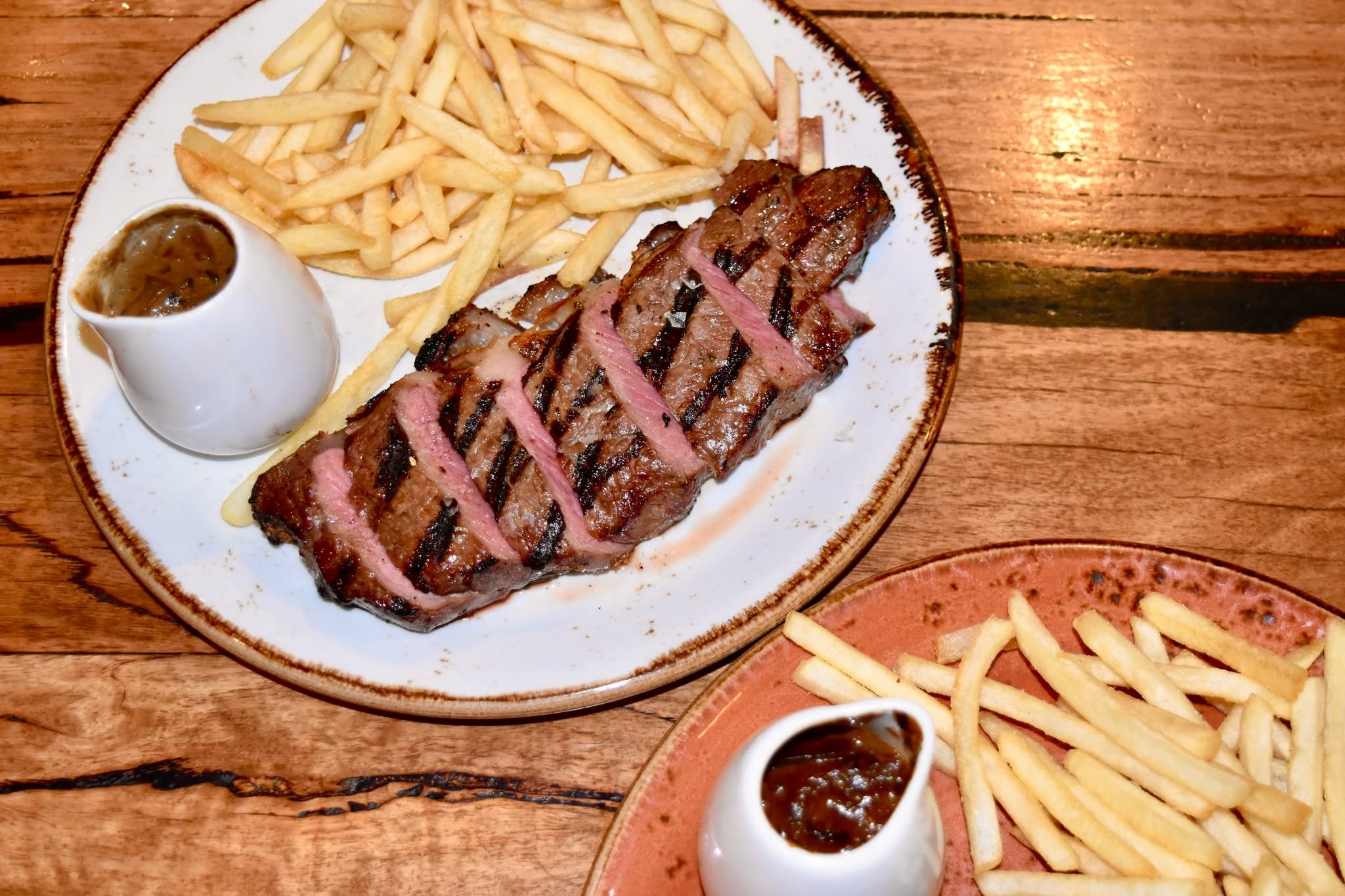 Who are you bringing to Steak Frites this Monday?

Join us from 5pm each week for our carved porterhouse, fries and your choice of red wine jus, caf&eacute; de Paris butter, creamy mushroom or peppercorn gravy, all for $28.

Come in early for Happy H