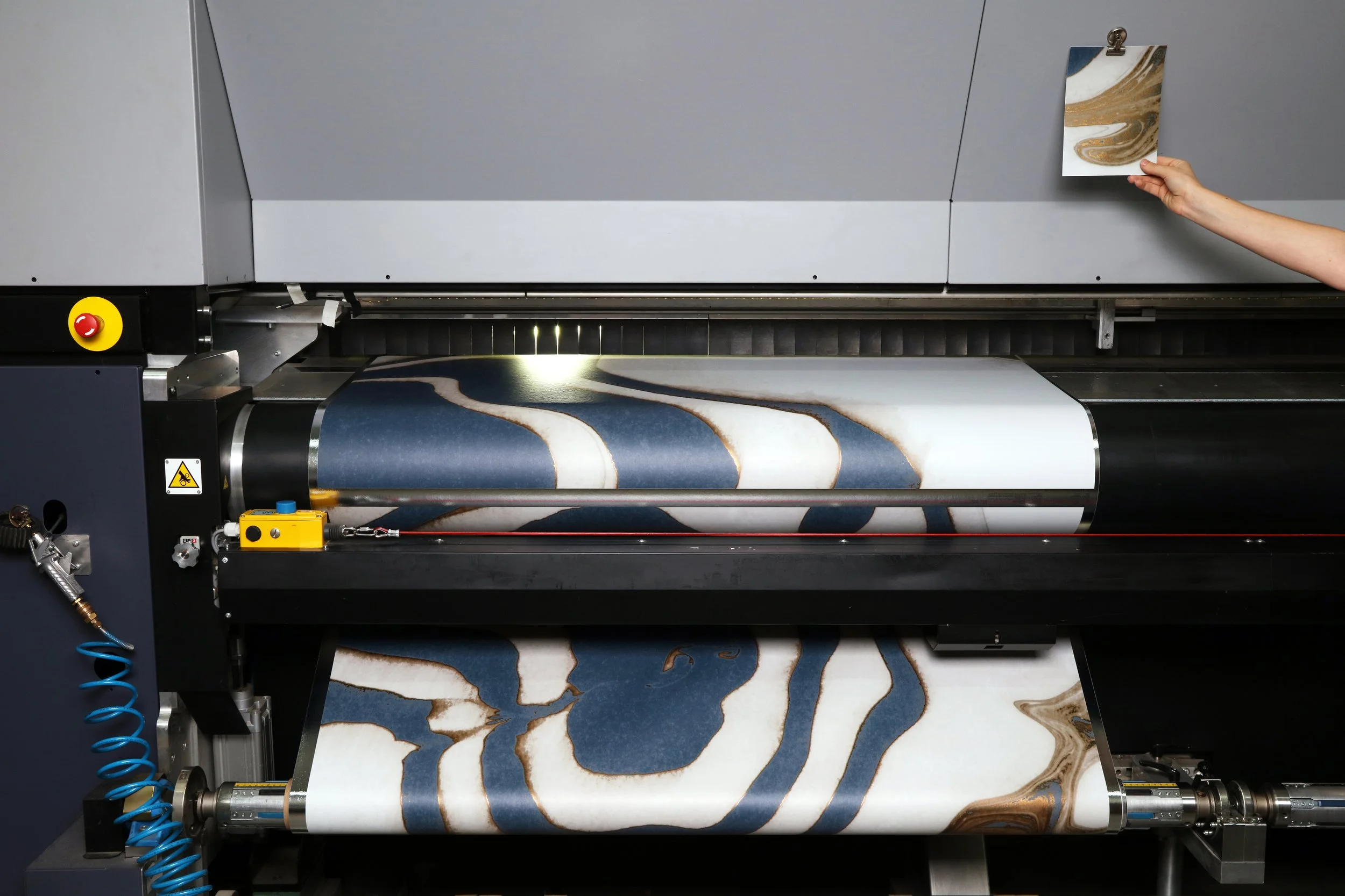 Final artwork printing with control cutting for color and quality control.