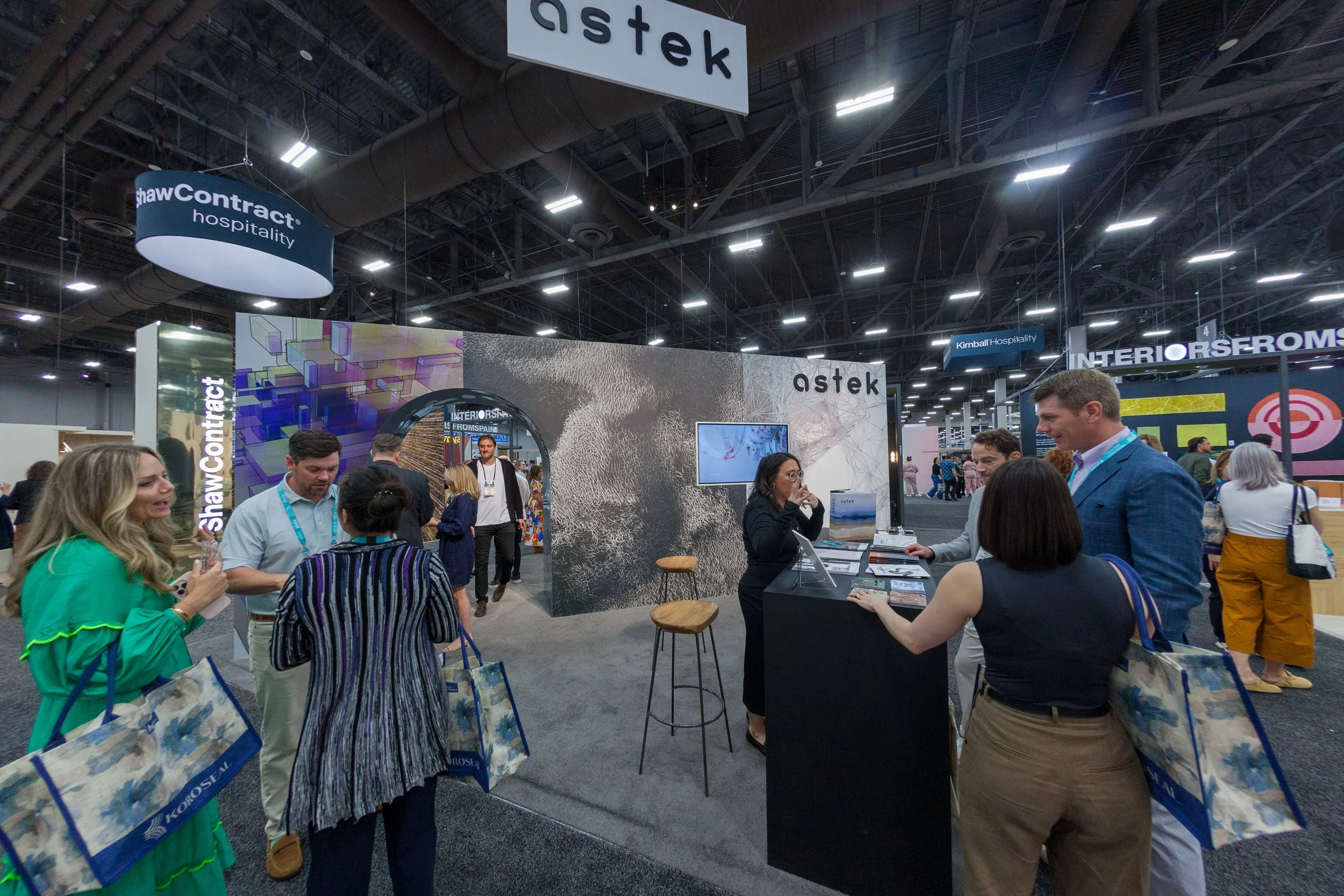 astek-kinetic-booth-attendees.jpg