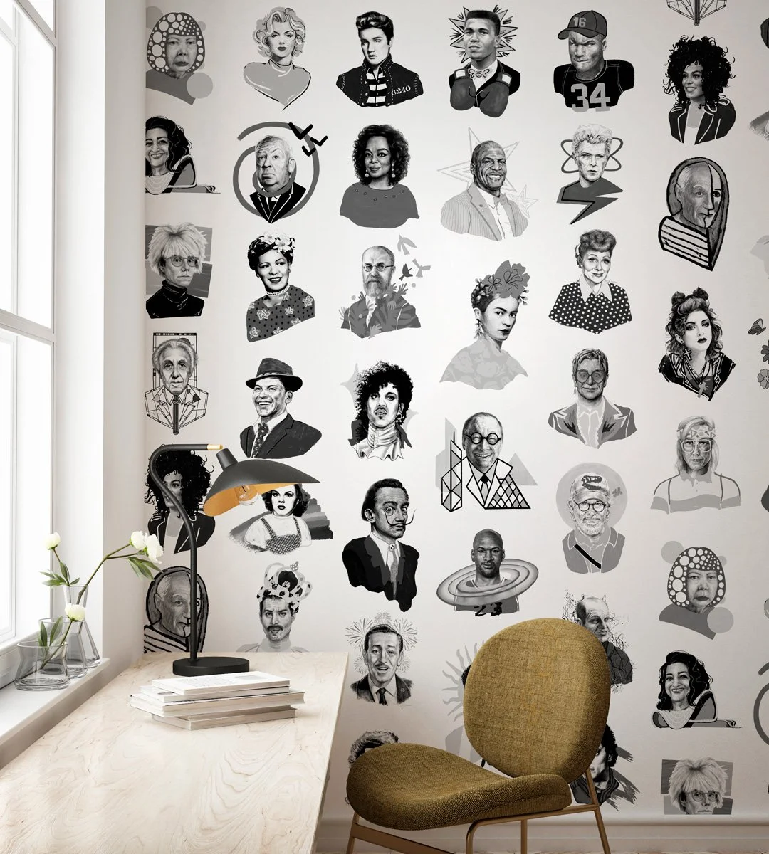 Greyscale mural from the Iconographic collection featuring illustrated portraits of cultural icons, installed in a bright home office with natural light, a wood desk, and a mid-century modern chair.