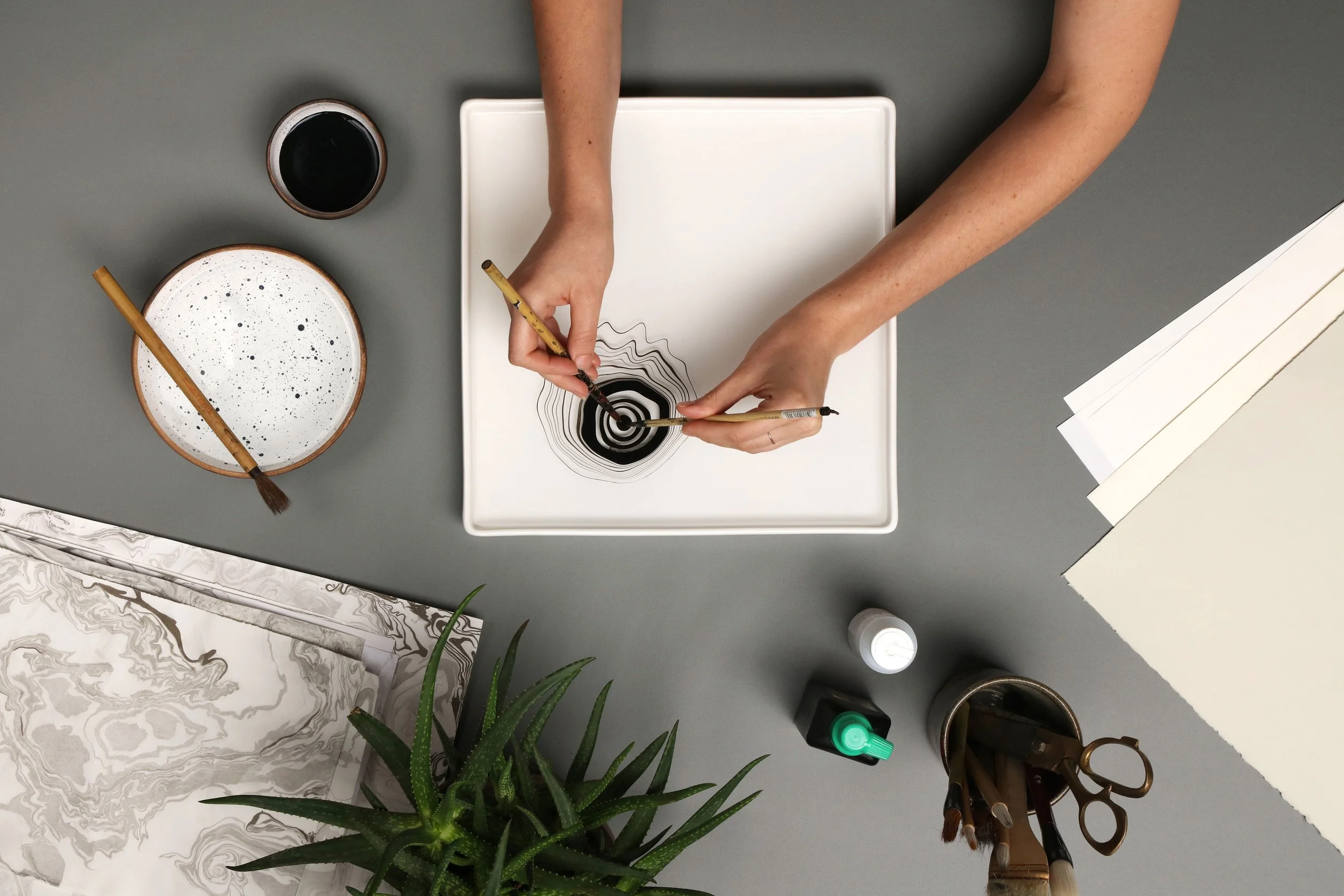 Astek designer creating a refined version of the client inspiration.