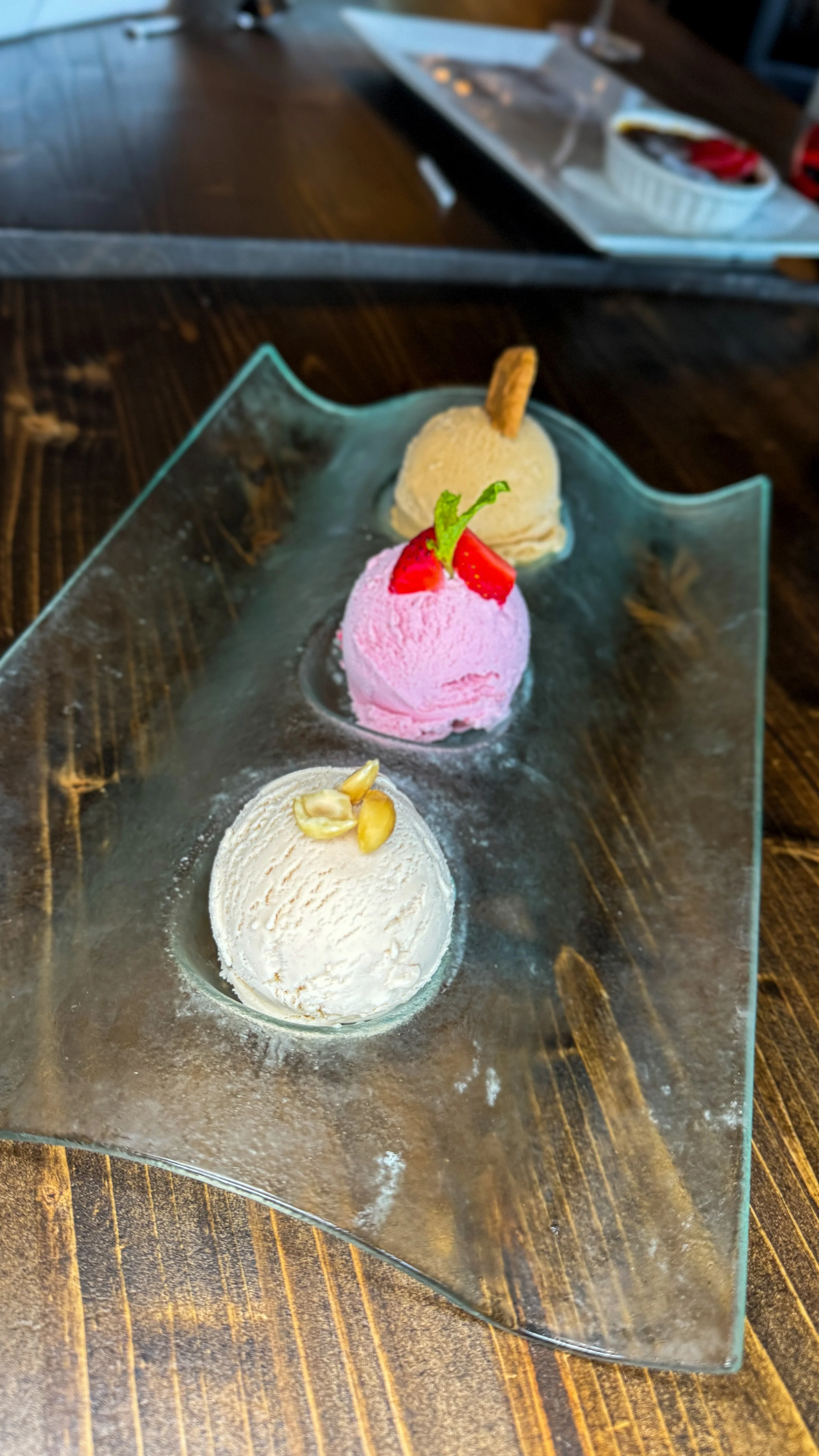 Gelato trio with vanilla, strawberry, & cherry scoops