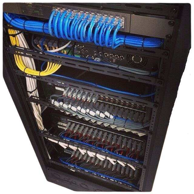 Inside a network server rack with multiple fiber optic cables connected to switches and patch panels.
