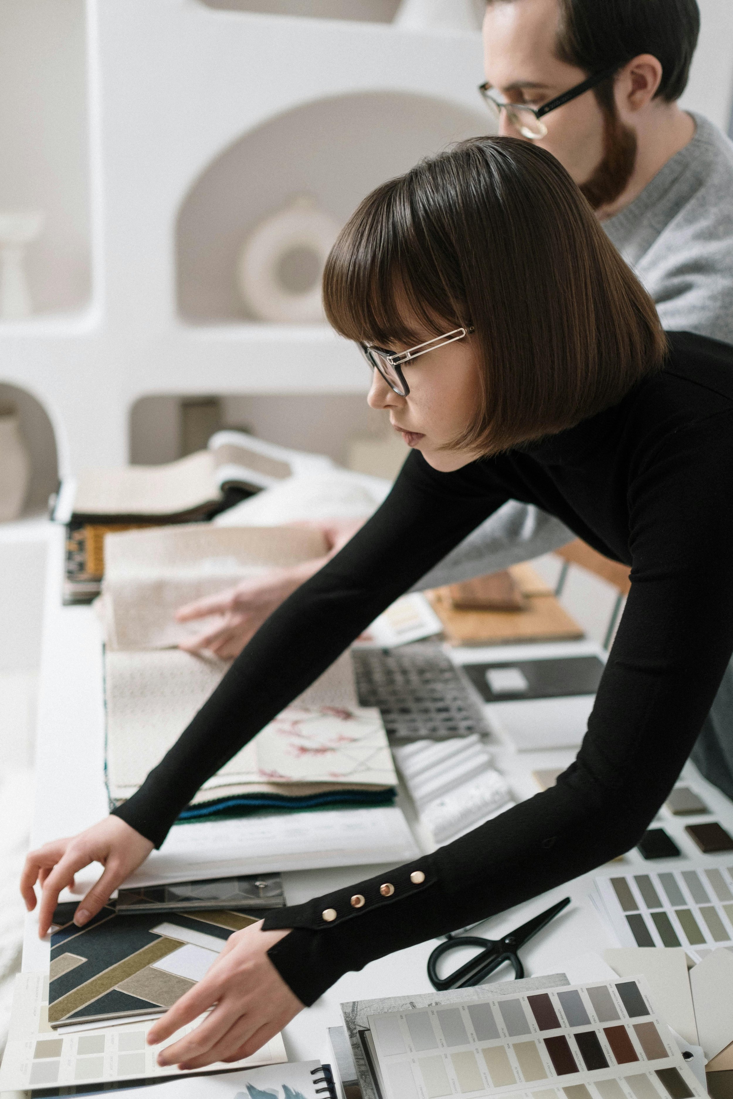 Architecture professional planning career transition strategy with portfolio review and career coaching materials