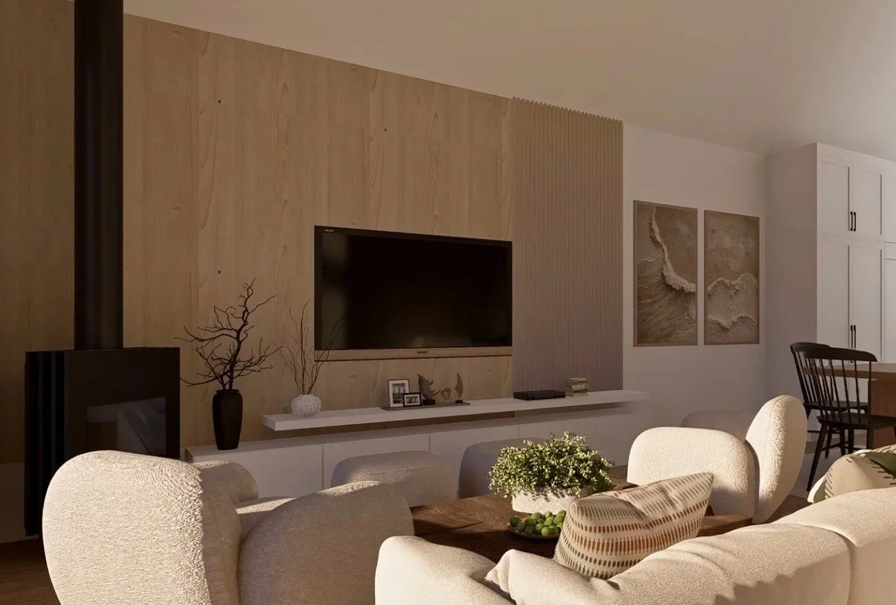 Modern living room with a flat-screen TV mounted on a wooden accent wall, beige sofas, and decorative sitting area with plants and artwork.