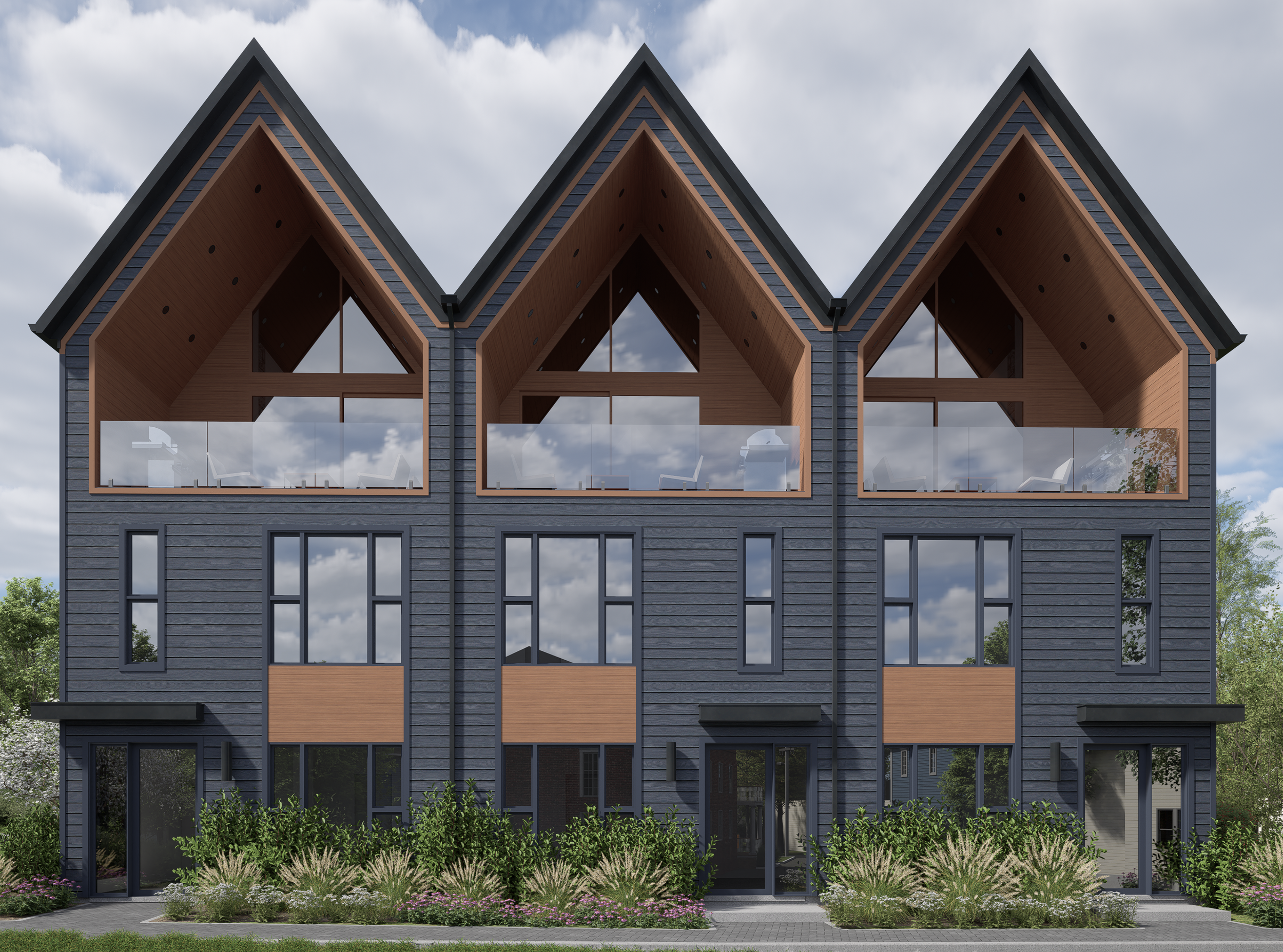 Modern townhouse with dark blue siding, large glass windows, and wooden accents, set against a partly cloudy sky, with landscaped greenery in the front.