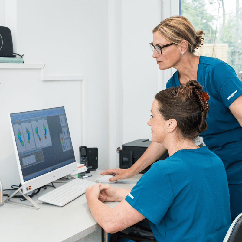 Reviewing foot scan images at The Beale Clinic