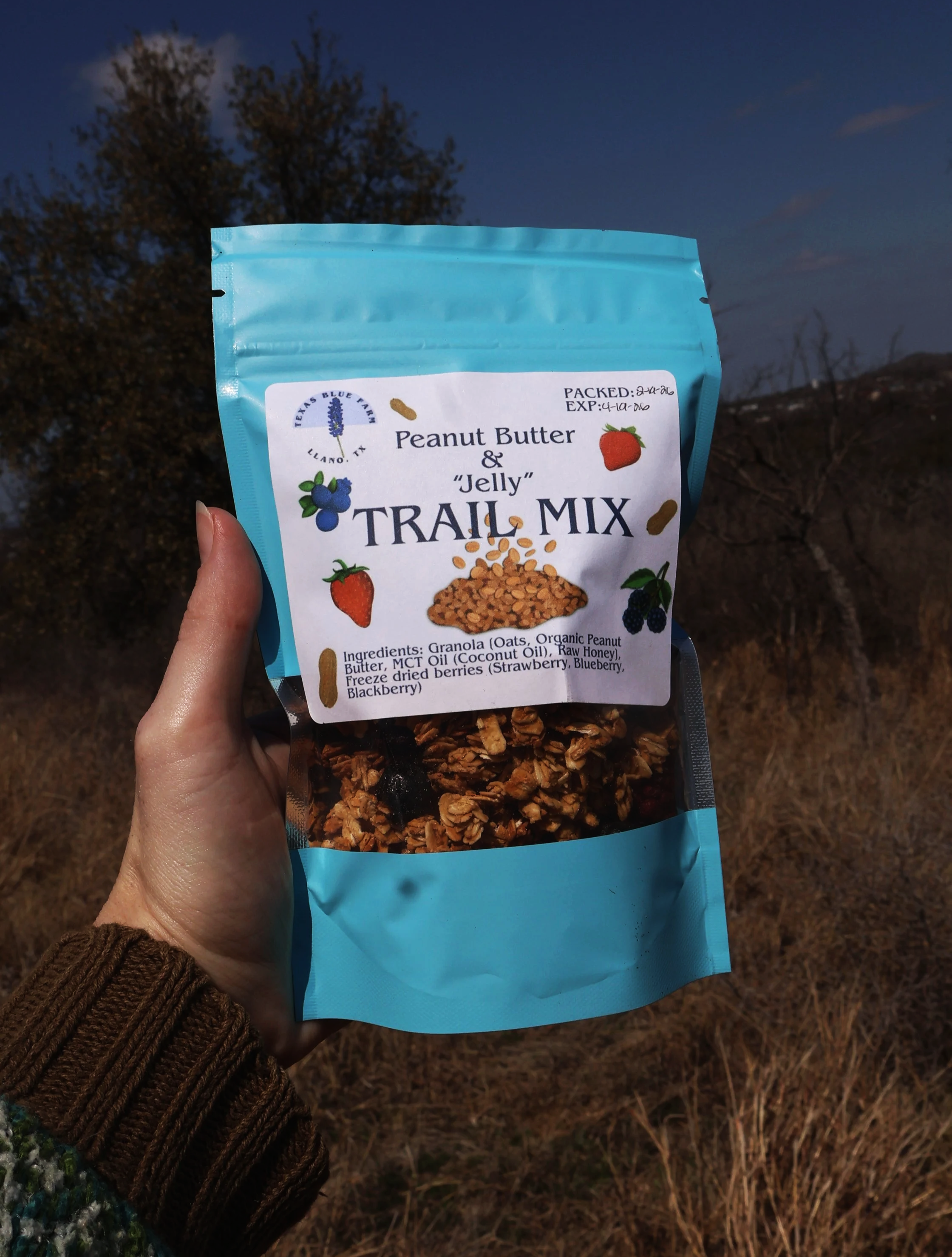 trail mix in hand outside