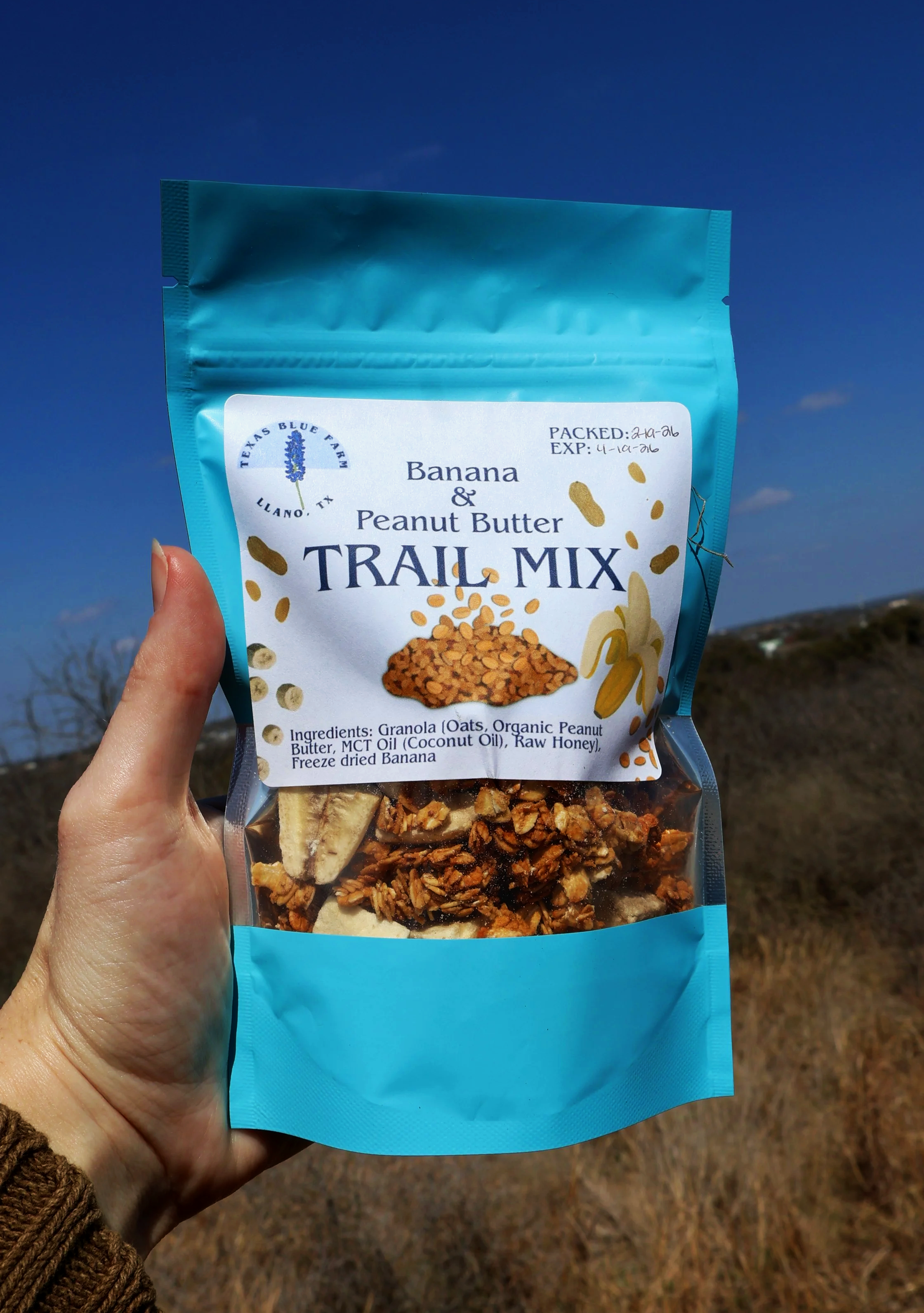 trail mix in hand outside