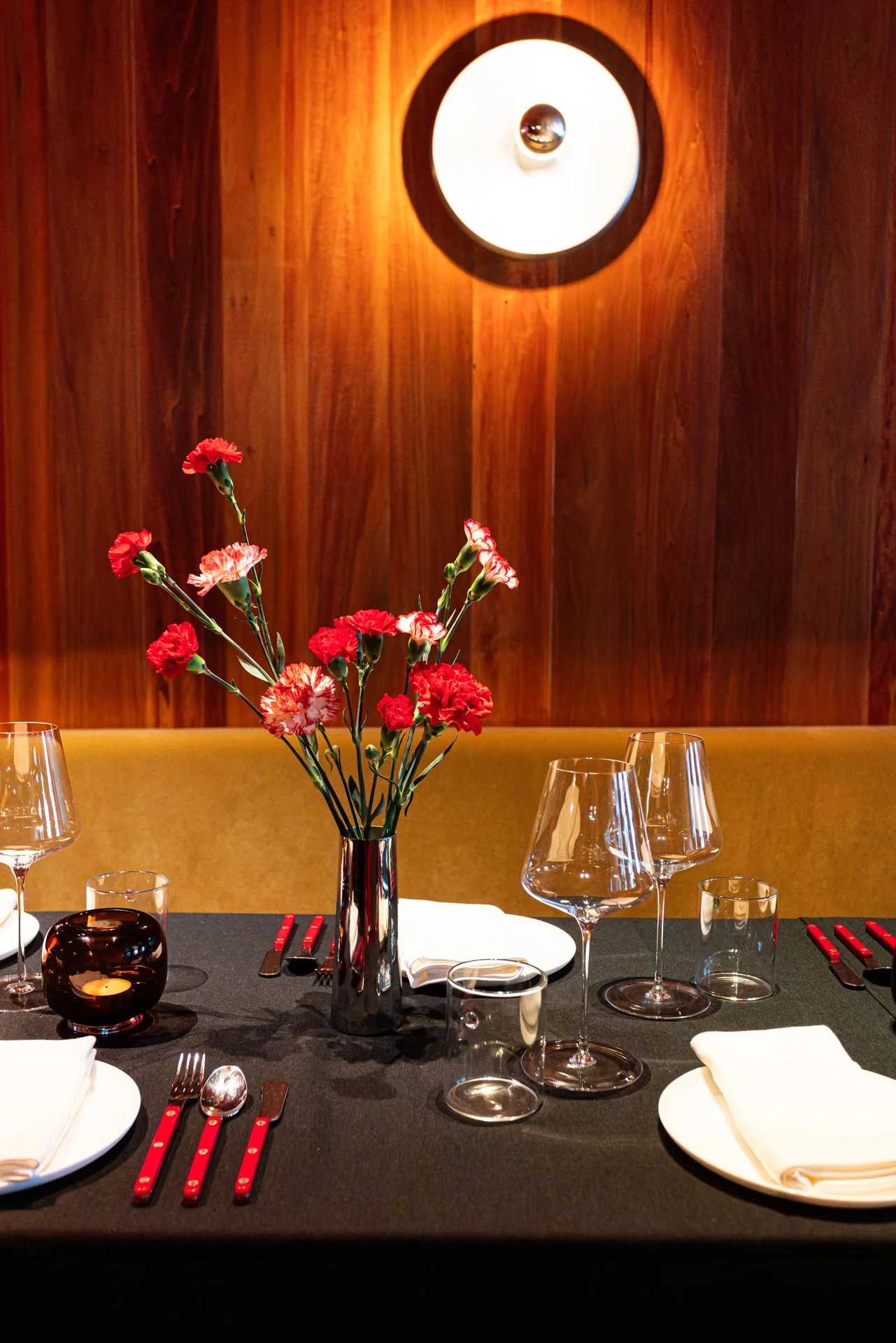 Dinner Table Decorated With Flowers