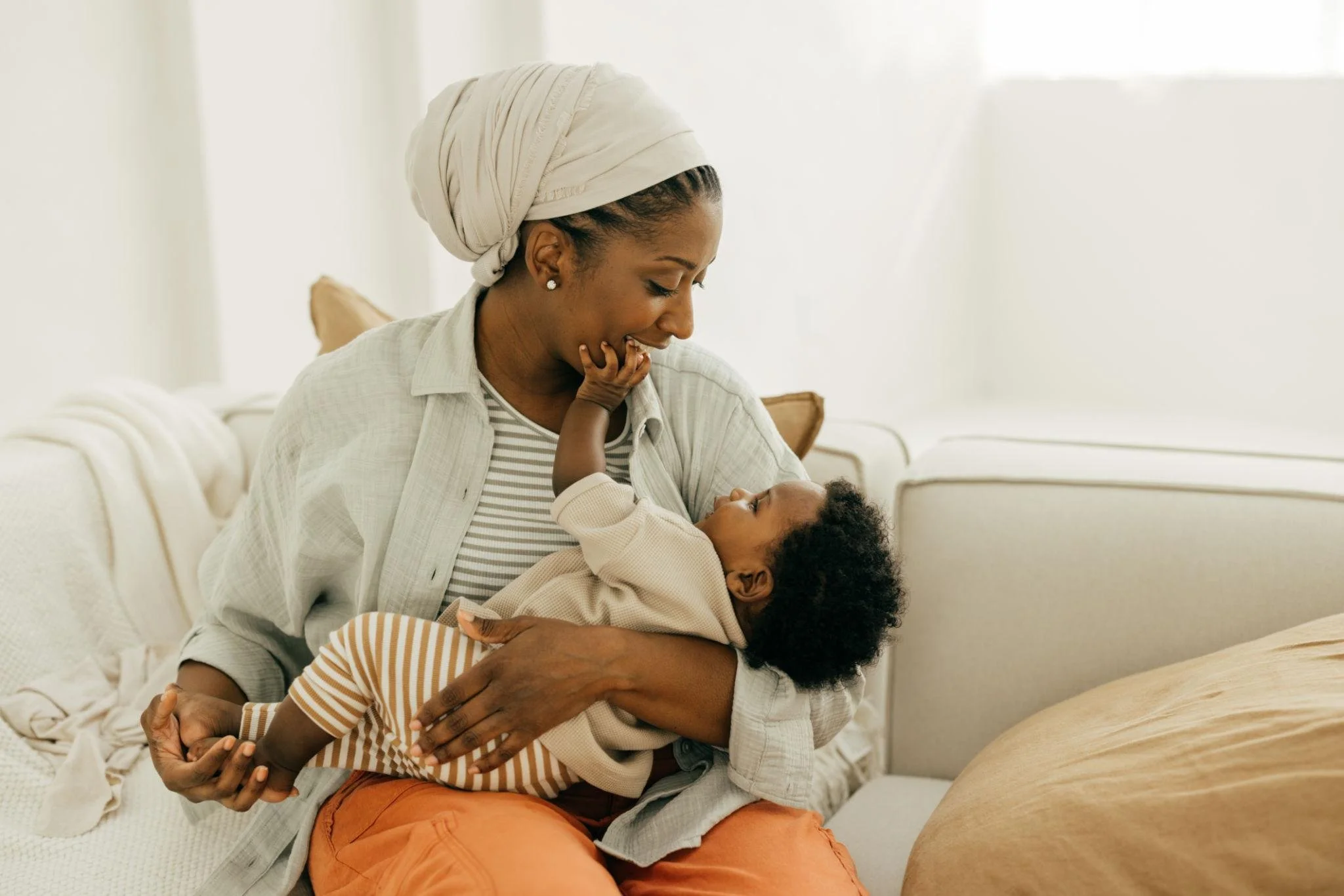 black mom holding baby.jpg