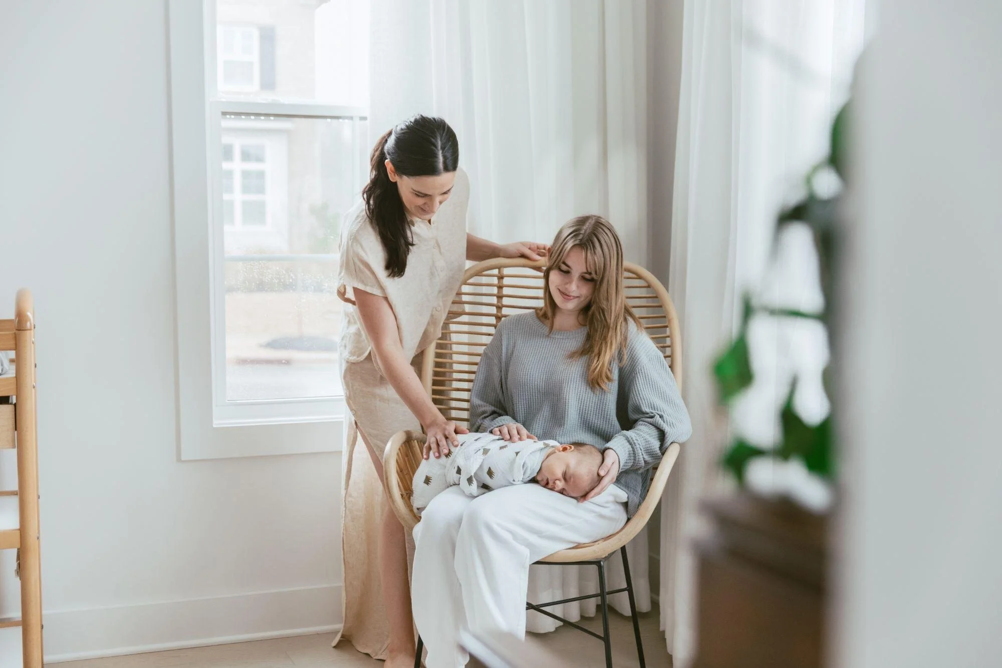 doula standing with mom and baby.jpg