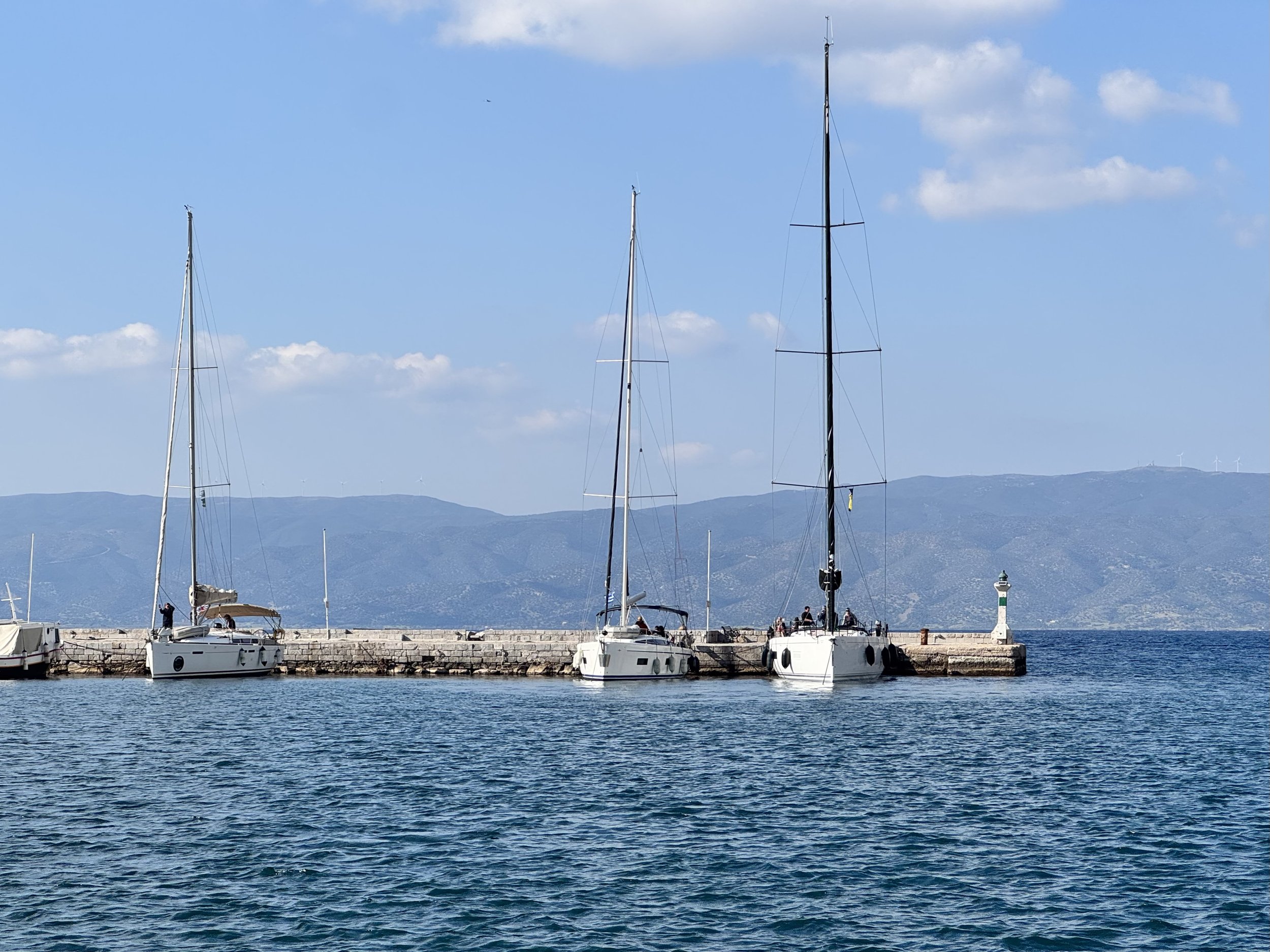 Sailboats docked in Hydra harbour Greece — travel guide to the Greek islands