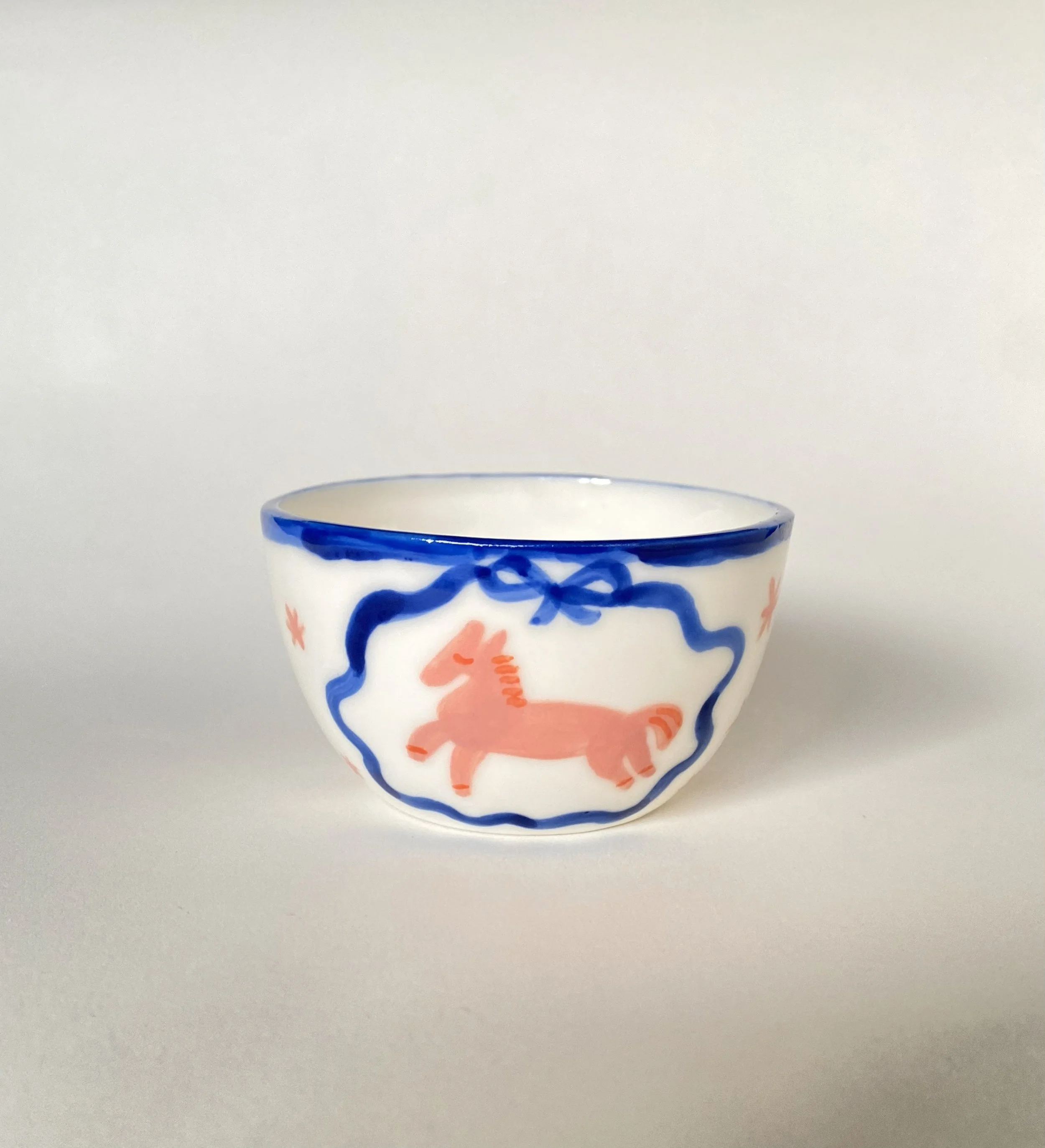 Cup with painted pink horse