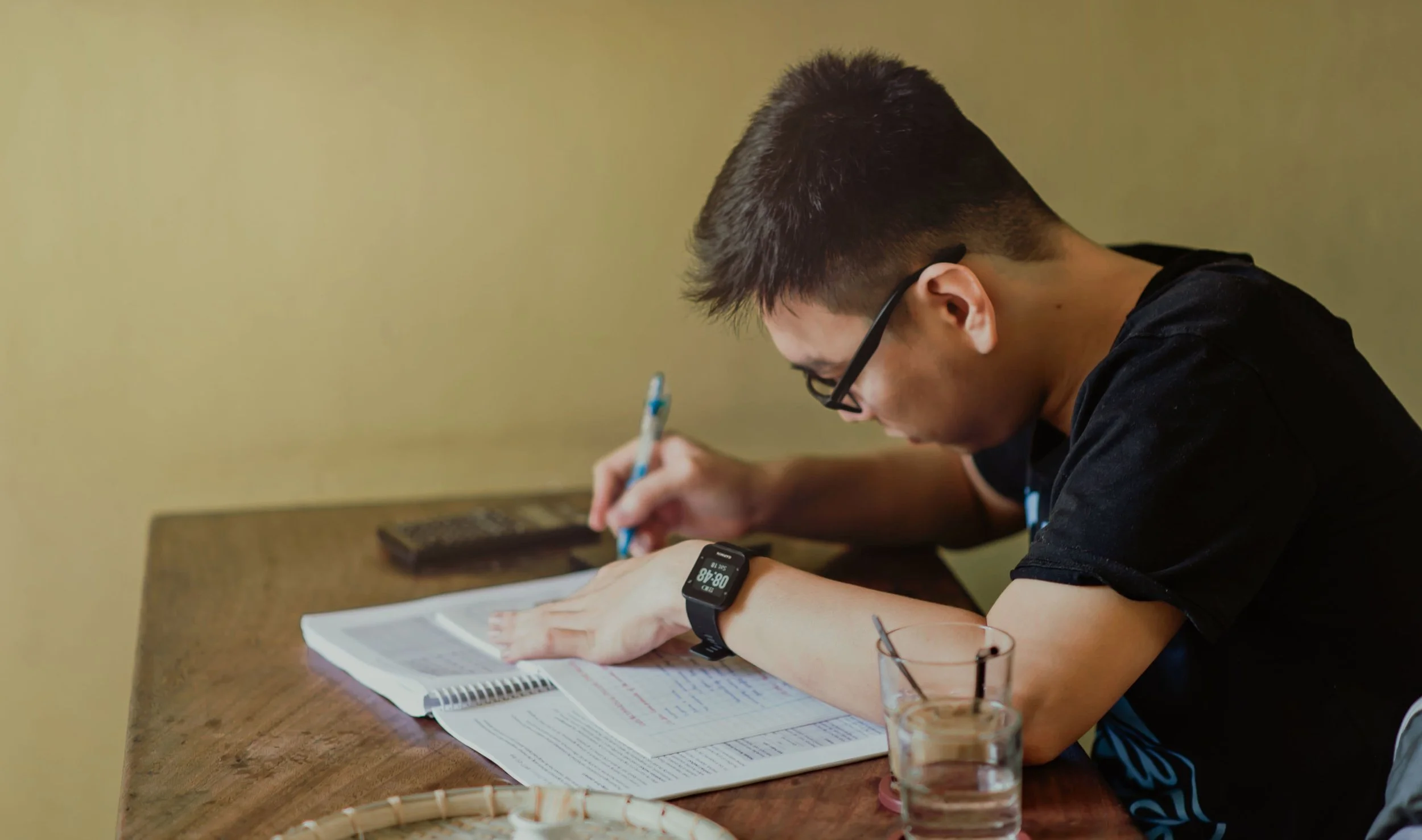 College student breaking a large paper into smaller steps