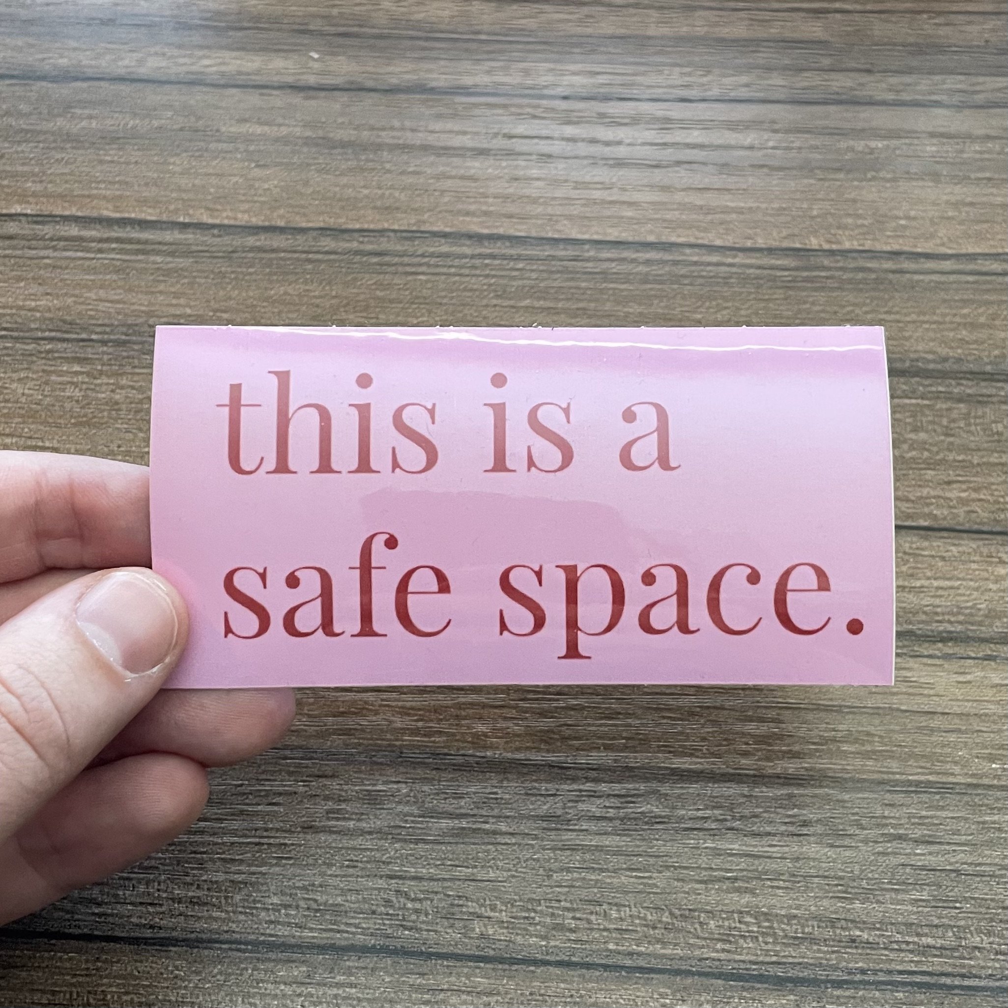 "this is a safe space" sticker, pink