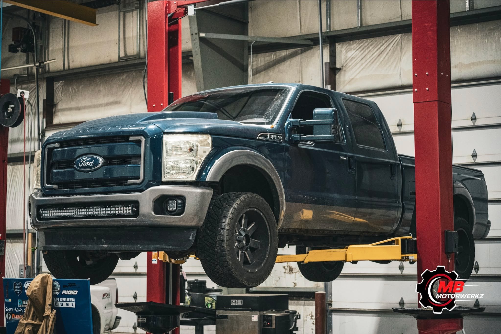 2011 Ford F-350 Super Duty 6.7L Powerstroke in for transmission cooler line repairs. This truck came in with leaking cooler lines, so we replaced the transmission oil cooler and both associated lines, then refilled the system with fresh fluid to ensu