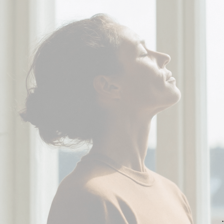 woman with face in the sunshine