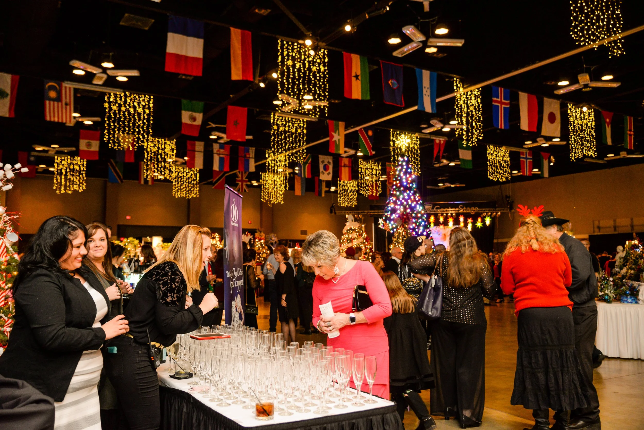 Necker's Jewelers providing hospitality to a Festival of Trees Premiere Party guest