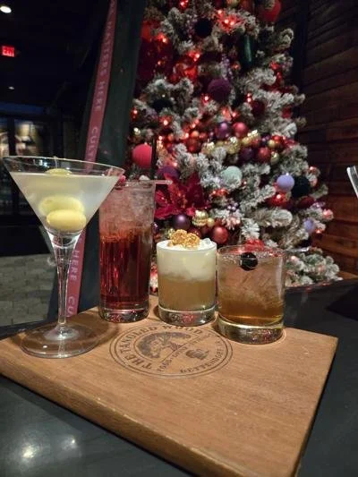 A display of four holiday drinks created by Tangled Wood in Bettendorf, IA