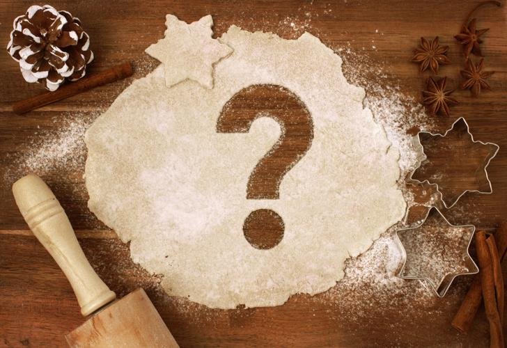 Cookie dough with question mark cut out of the dough