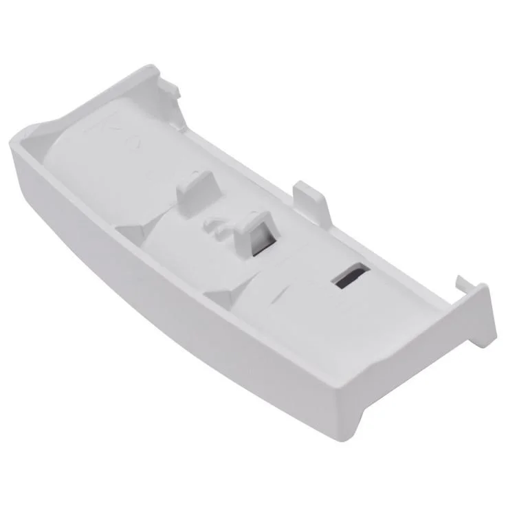 A white plastic battery cover for a remote control or electronic device.