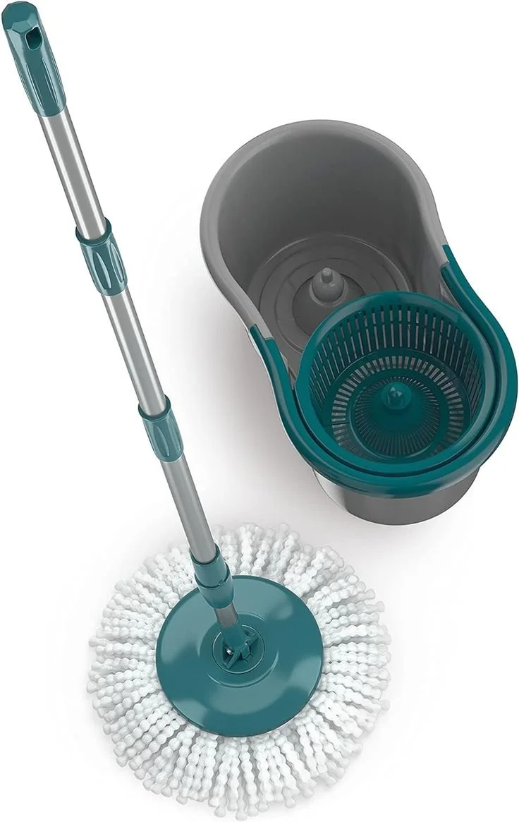A spin mop with a white mop head, a teal handle, and a gray and teal bucket with a rotating scrubber inside.