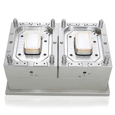 Metal mold with two rectangular cavities, used for manufacturing or casting.