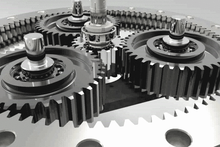 Close-up of metal gears interlocked in a mechanical system.