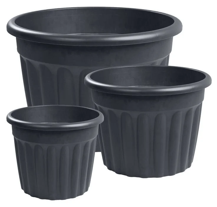 Three black plastic plant pots of varying sizes stacked together.
