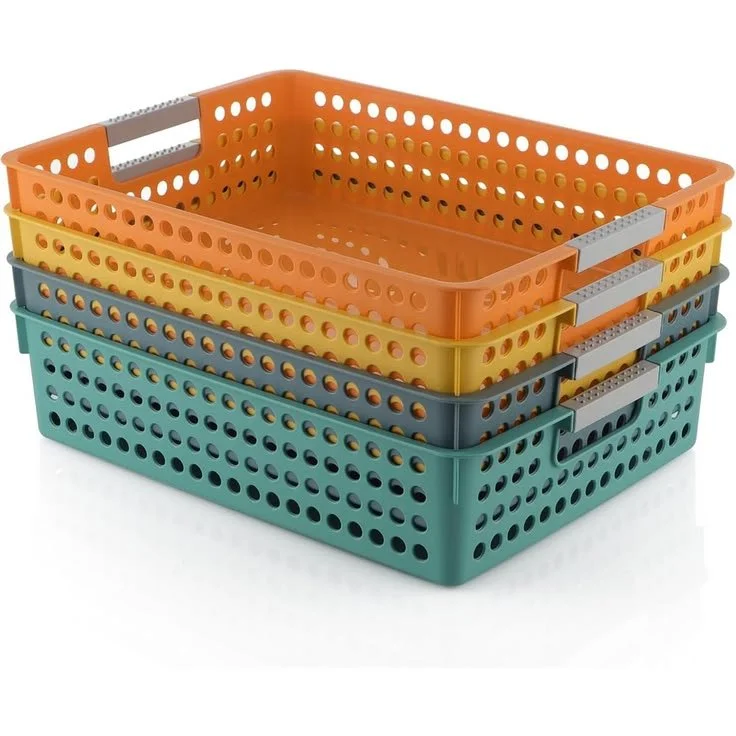 Stacked plastic storage baskets in orange, yellow, gray, and teal with handles.