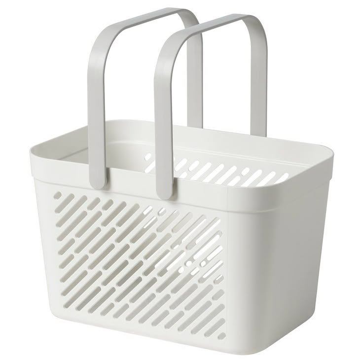 White plastic shopping basket with two handles and slotted sides.